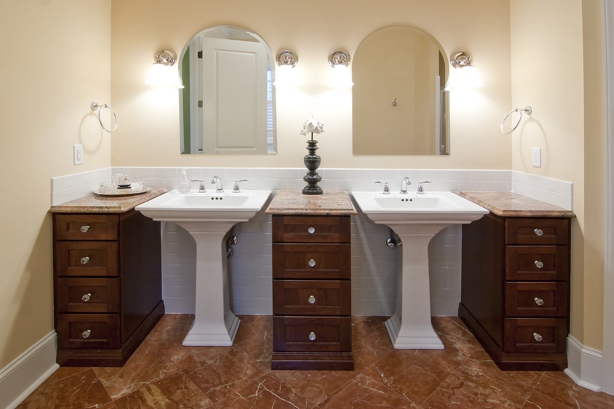 cabinet ideas between bathroom sinks